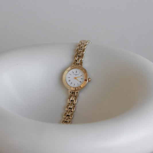 Reloj vintage Lancel redondo dorado claro