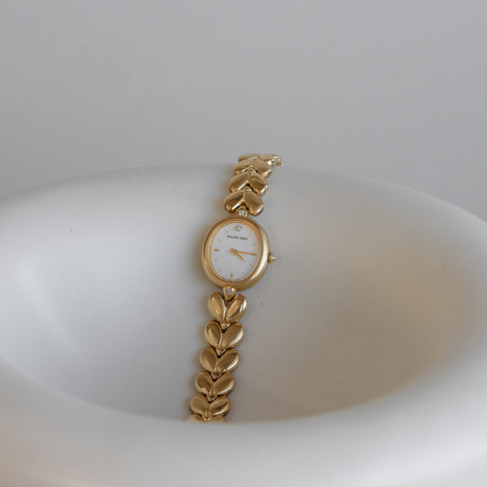 Reloj vintage Philippe Venet ovalado de oro