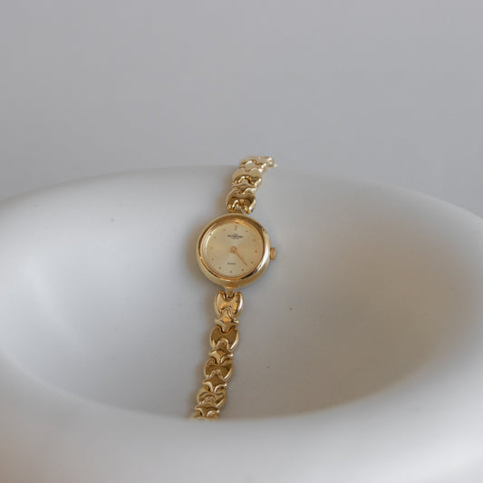 Reloj vintage John Richmond redondo de oro