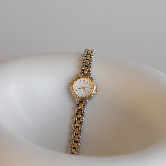 Reloj Citizen Cletia vintage redondo de dos tonos