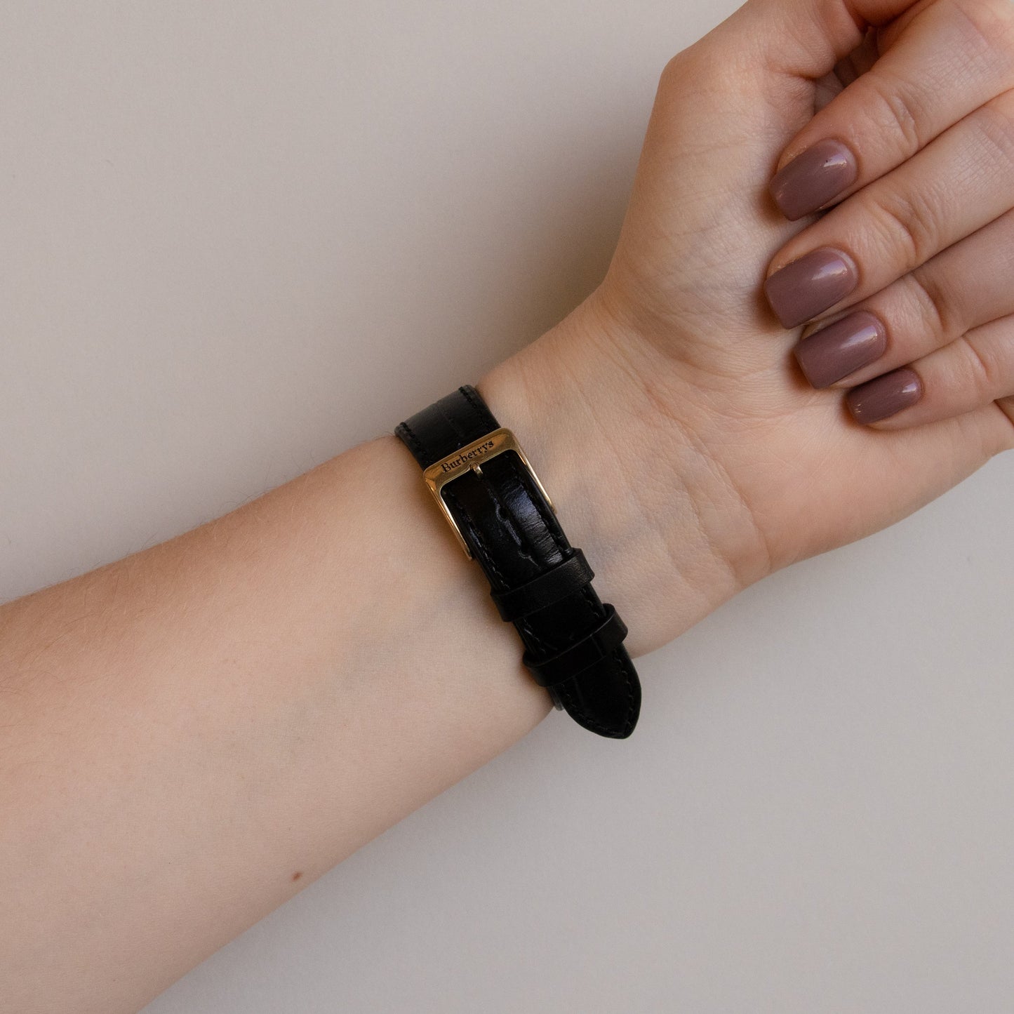 Vintage Burberrys Bold Black Strap Gold Watch