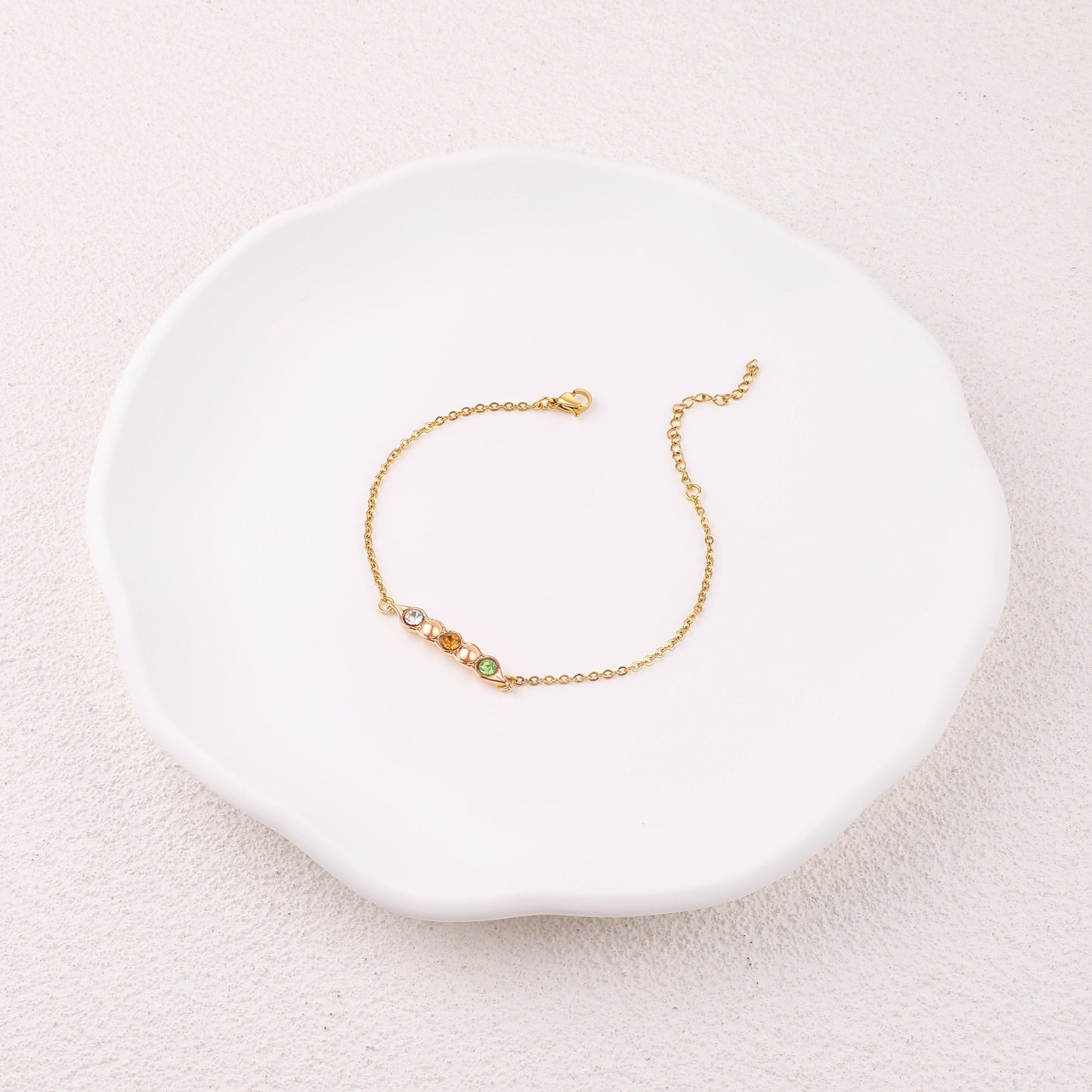Erbsen in einer Schote Geburtssteinarmband