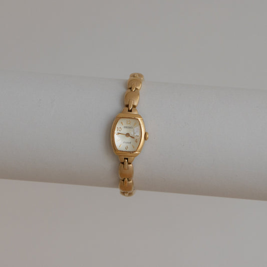 Reloj vintage Seiko Tisse con eslabones ovalados dorados