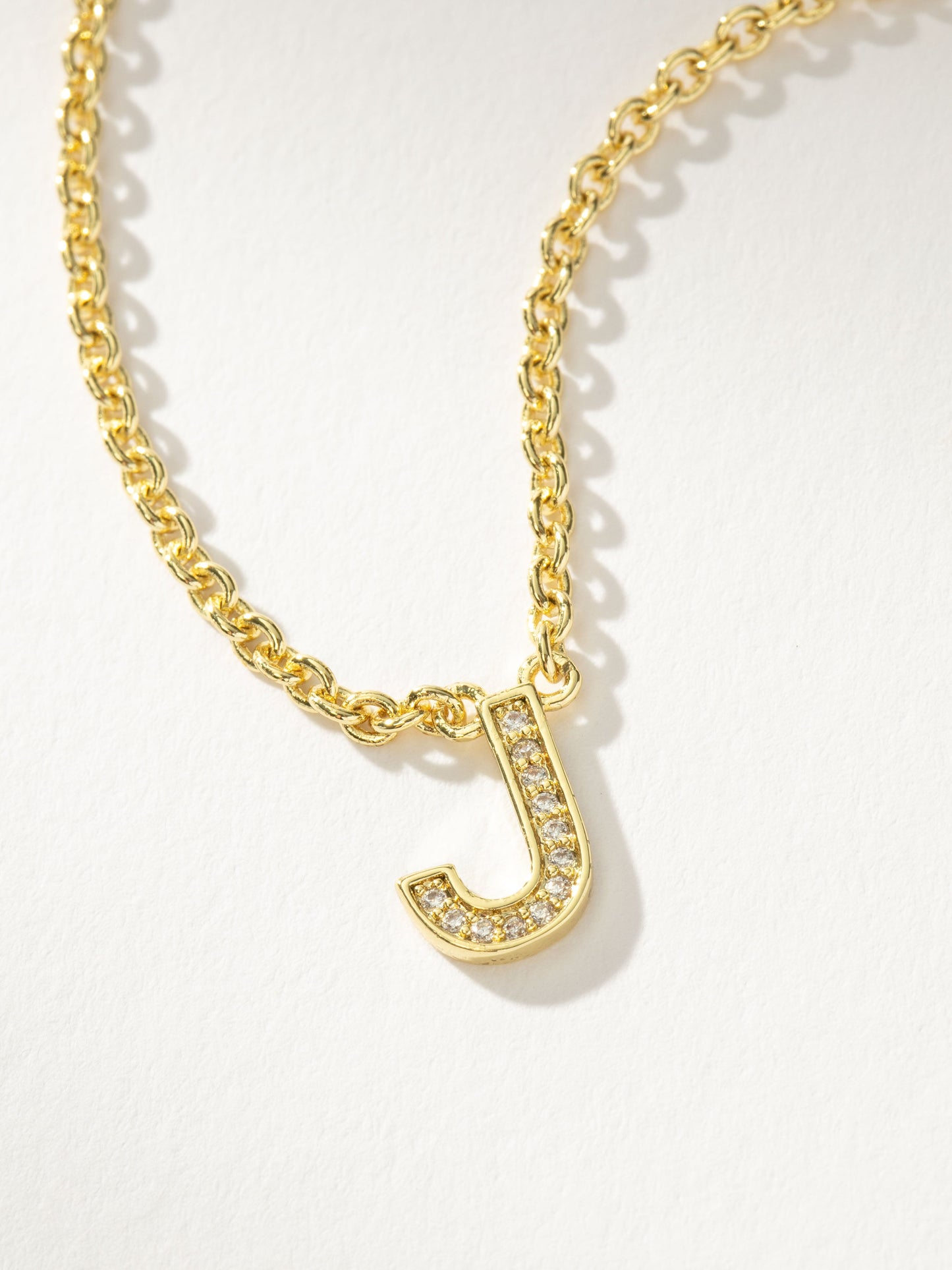 Collar con inicial aquí