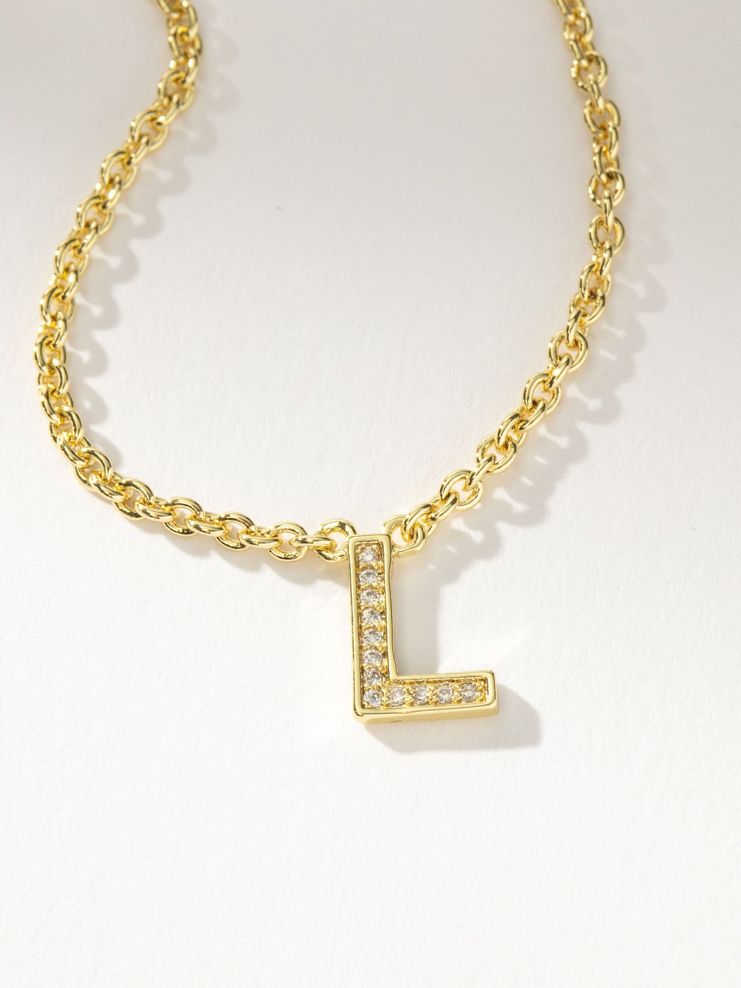 Collar con inicial aquí