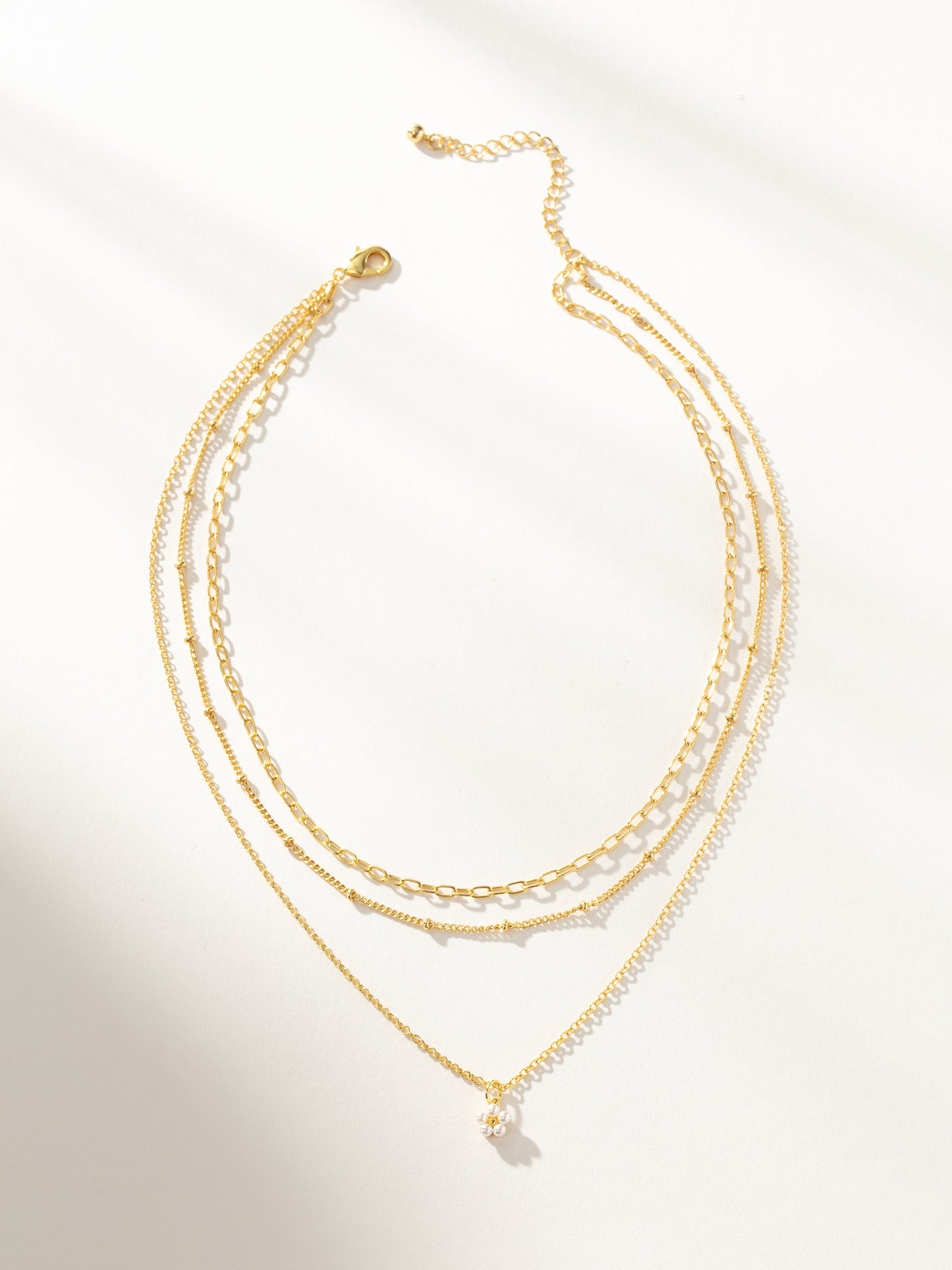 Collar con colgante de flores