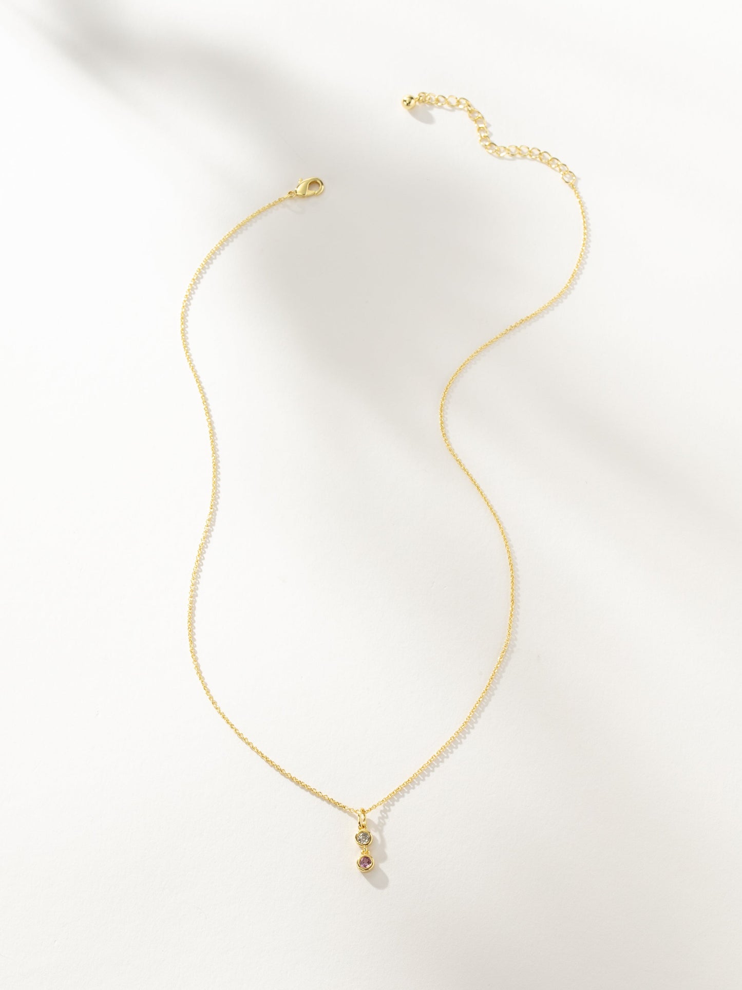 Collar de gemas rosas y blancas