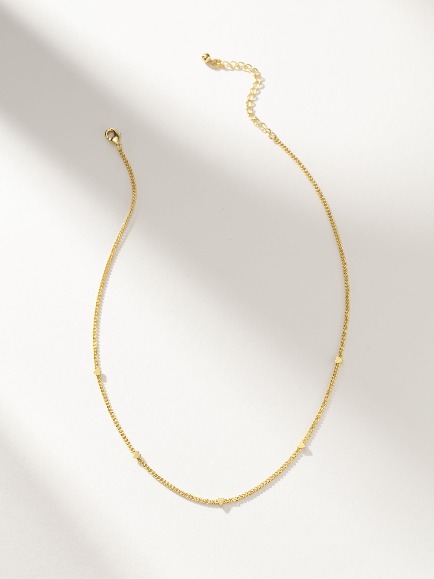 Collar de corazón estampado