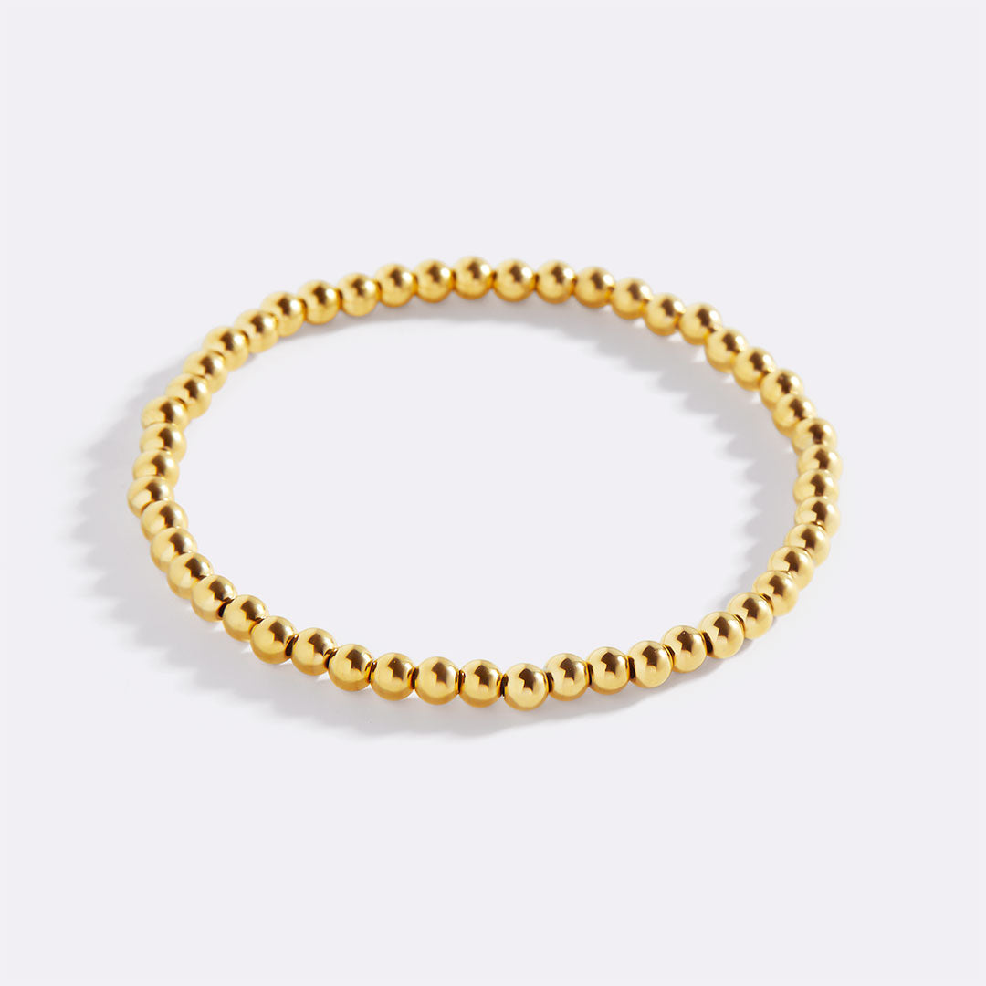 Zierliches goldenes Stapelarmband