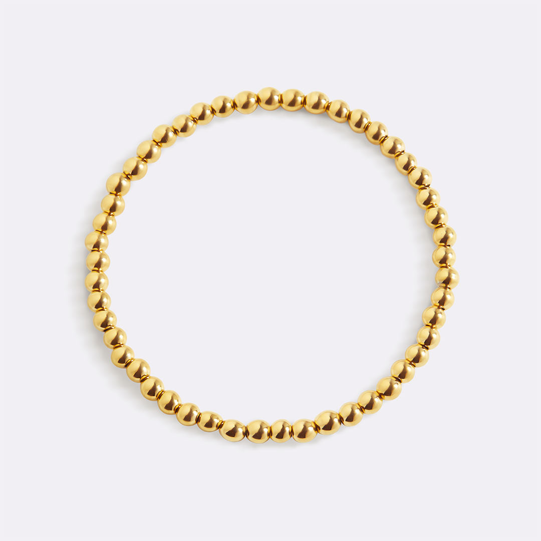 Zierliches goldenes Stapelarmband