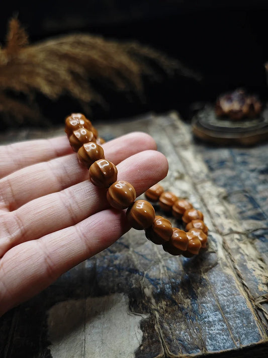 Small Walnut Carved Shark Fin Bead Bracelet - Touch Bling