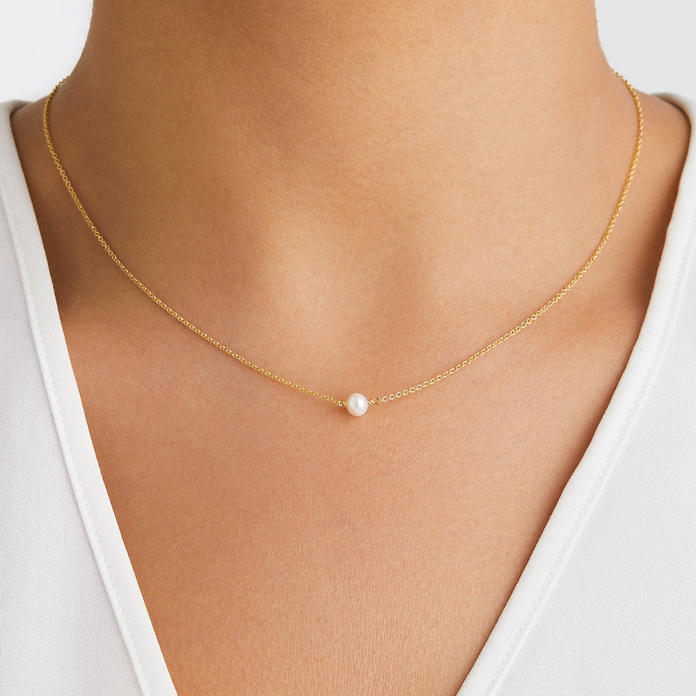 Geschenkset mit goldener Halskette und Armband mit einer Perle