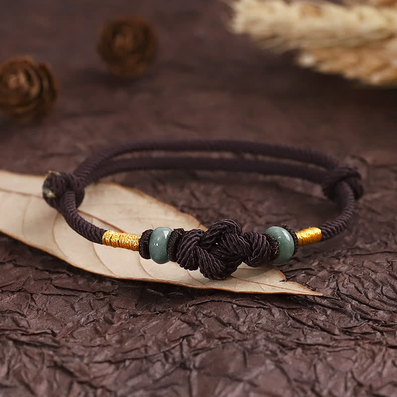 Pulsera trenzada con nudo de la fortuna y jade rojo de Buda