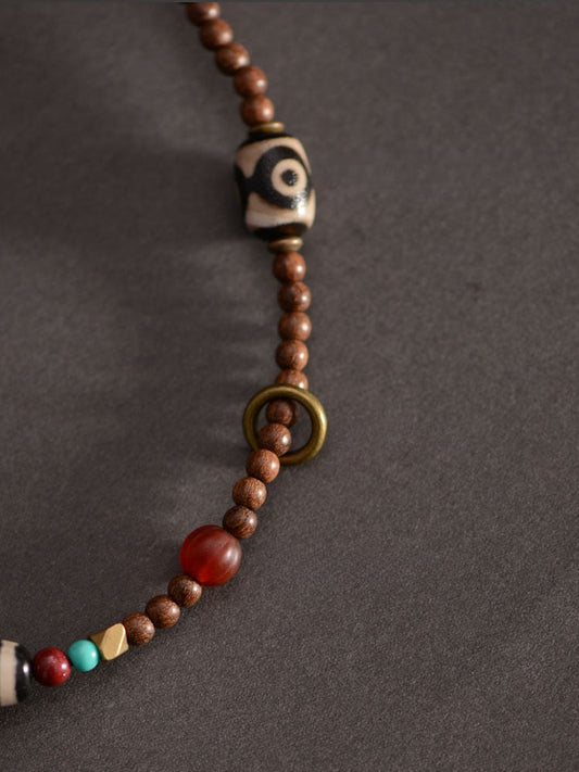 Goldener Sandelholz-Anhänger aus tibetischen Dzi-Perlen, 58 mm