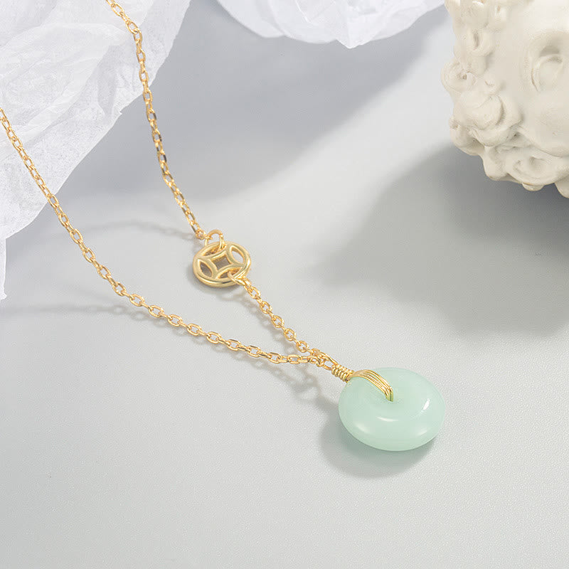 Colgante de collar con hebilla de paz y abundancia con símbolo de jade fu y moneda de cobre y piedras de Buda