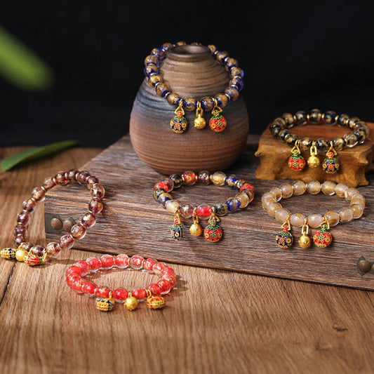 Pulsera con abalorios de cristal Liuli con piedras de Buda, doradas y plateadas, con la familia de la bestia devoradora de oro.