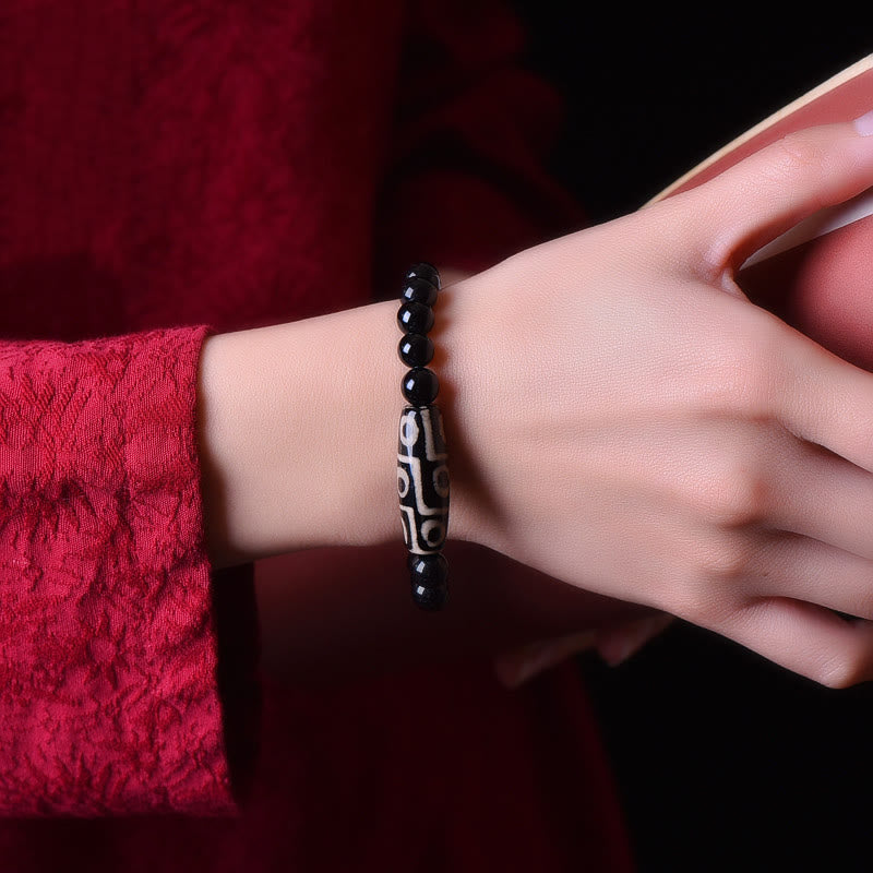 Pulsera tibetana de cuentas Dzi de nueve ojos con piedras de Buda y poder de la riqueza