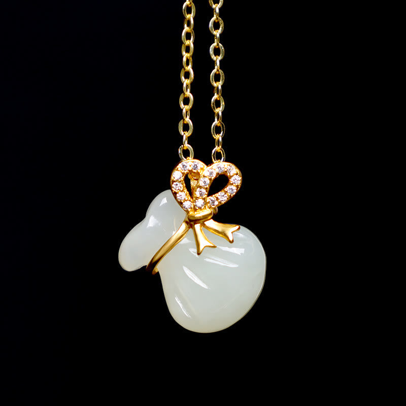 Colgante de jade blanco hetiano natural con piedras de Buda y bolsa de dinero de la suerte
