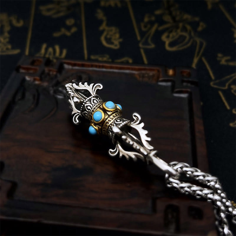 Collar con colgante de metal de cobre con diseño de dorje vajra tibetano y piedras de Buda.