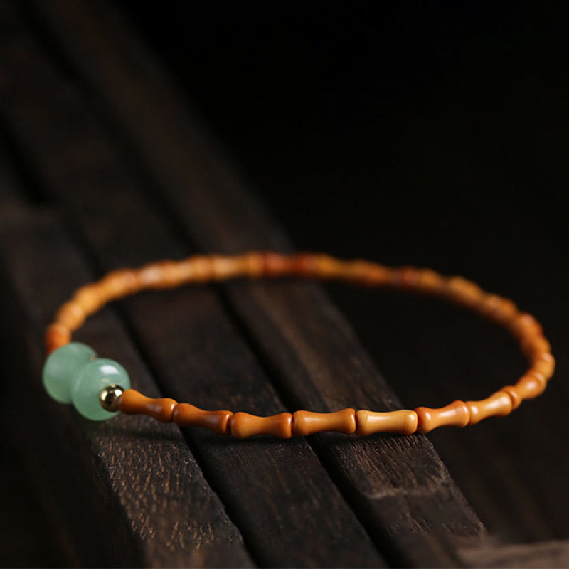 Pulsera de la suerte con diseño de bambú y aventurina verde hueso de oliva natural de Buddha Stones