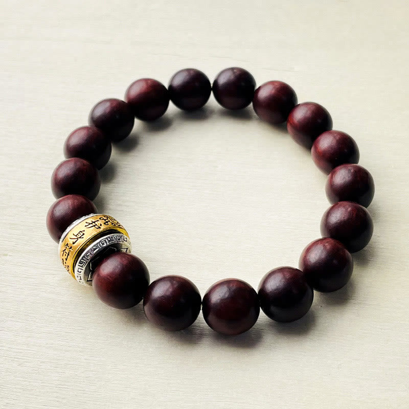 Pulsera protectora con amuleto de sándalo rojo y hojas pequeñas de Buda
