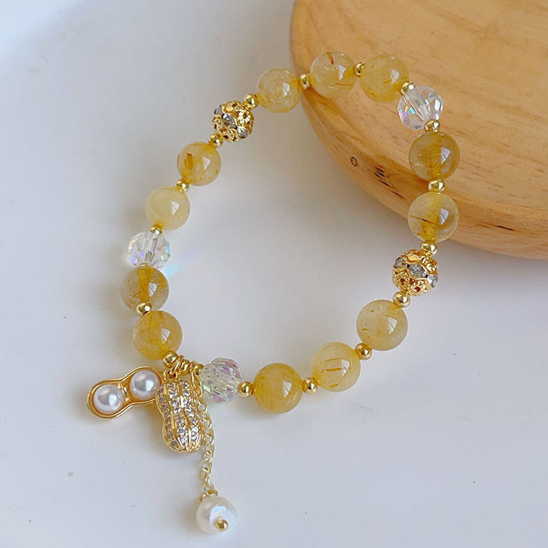 Pulsera con dije de cacahuete de la riqueza de cuarzo rutilado colorido y piedra solar de Buda