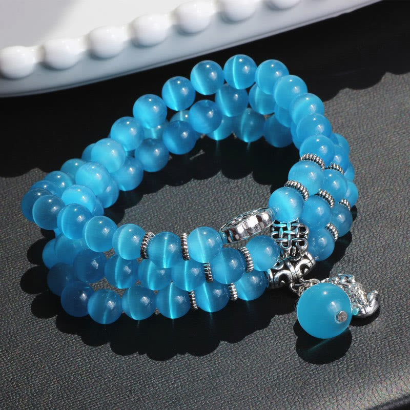 Pulsera triple vuelta con soporte PiXiu de ojo de gato y piedras de Buda