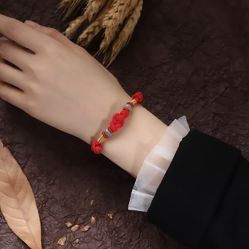 Pulsera trenzada con nudo de la fortuna y jade rojo de Buda