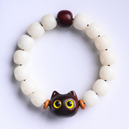 Pulsera de Buda con semillas de Bodhi naturales, hojas pequeñas, sándalo rojo, madera de ébano y gato de la suerte.
