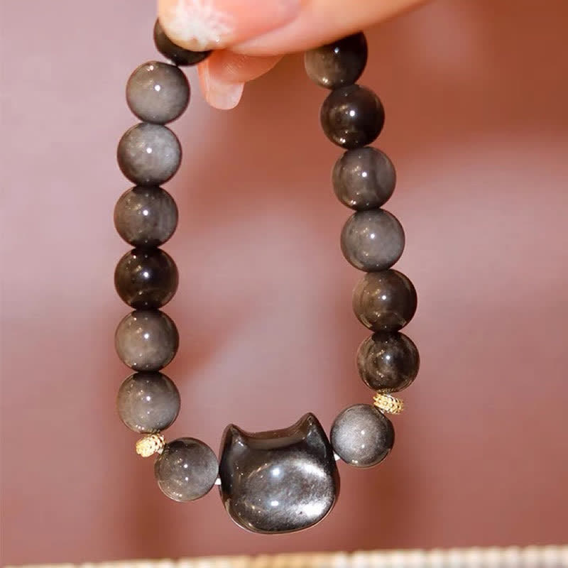 Pulsera de protección con piedras de Buda, obsidiana dorada y obsidiana plateada con brillo, con forma de pata de gato de la suerte.