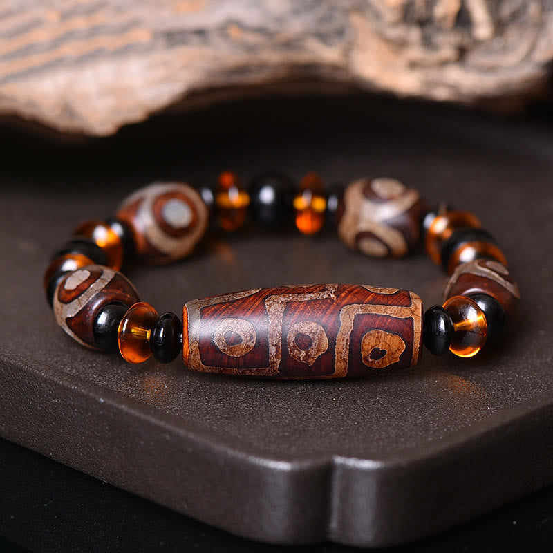 Pulsera tibetana retro de cuentas Dzi de nueve ojos con bendiciones de piedras de Buda