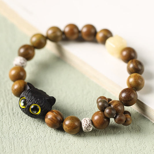 Pulsera relajante de paz con gato de madera de ébano y sándalo verde de Buddha Stones