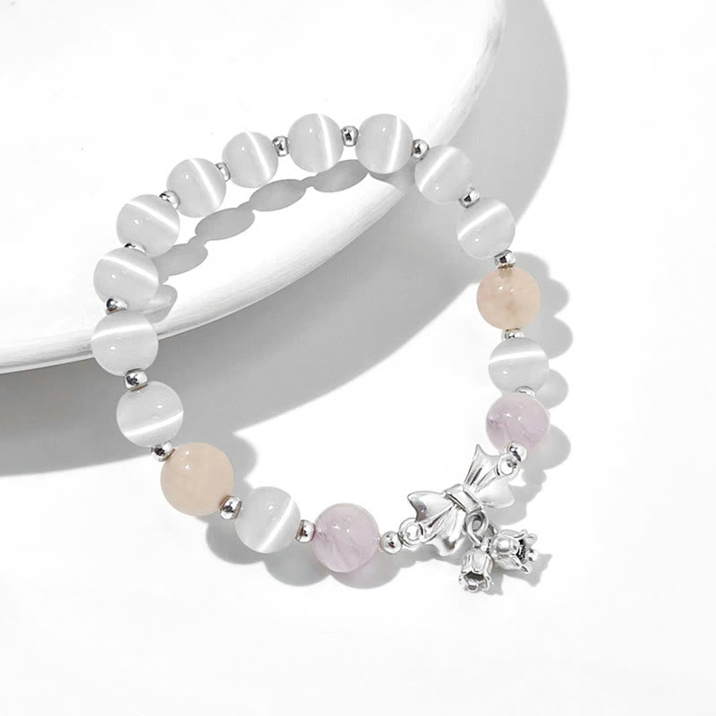 Pulsera con dije de roseta de amatista y lavanda con ojo de gato y piedras de Buda