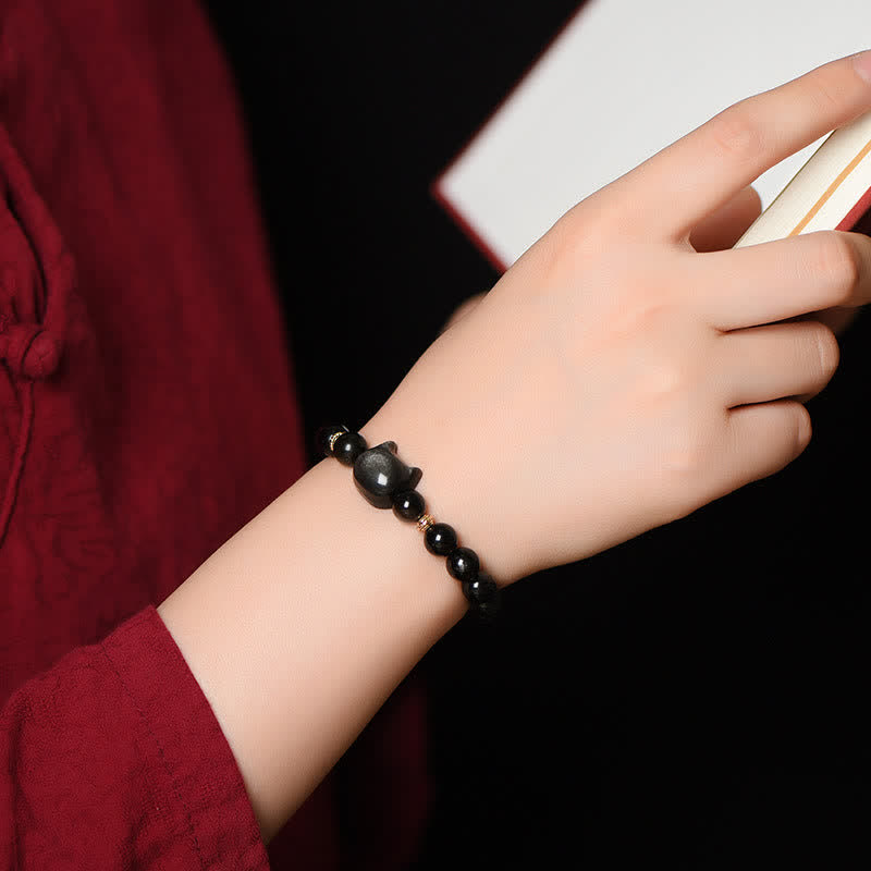 Pulsera de protección con piedras de Buda, obsidiana dorada y obsidiana plateada con brillo, con forma de pata de gato de la suerte.
