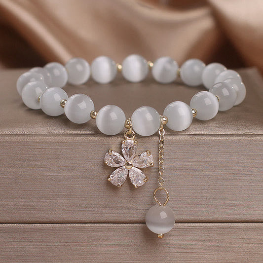 Pulsera de apoyo a la paz con dije de flor de ojo de gato y piedras de Buda