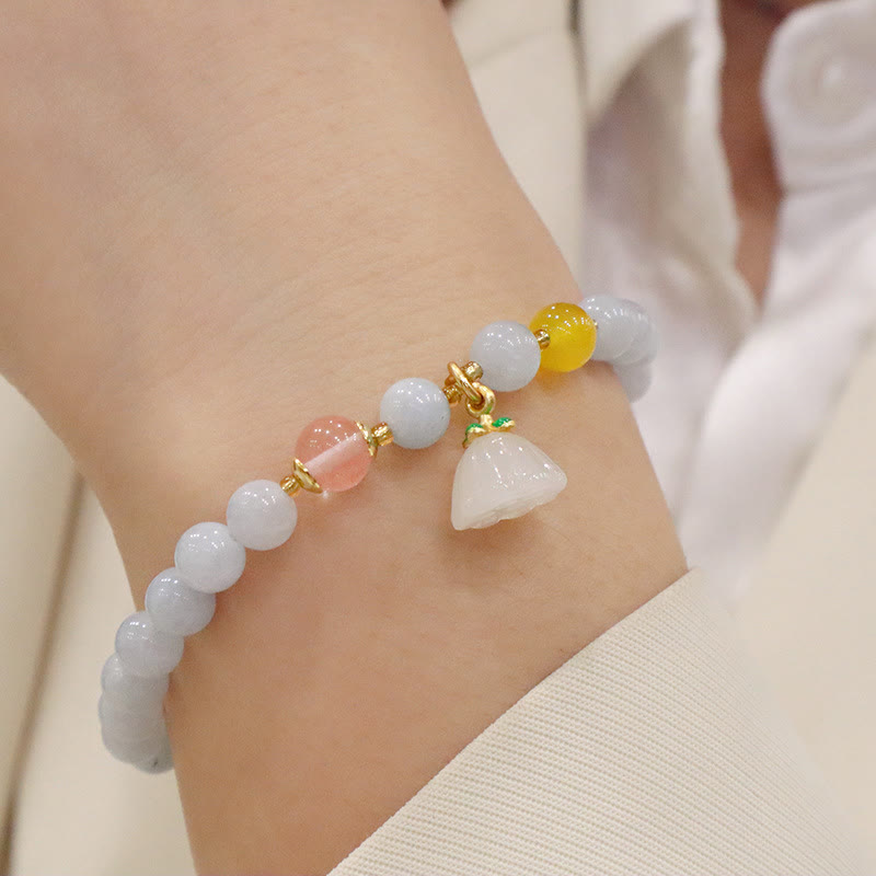 Pulsera con dije de gato, calabaza, conejo y calcedonia natural de aguamarina y piedras de Buda