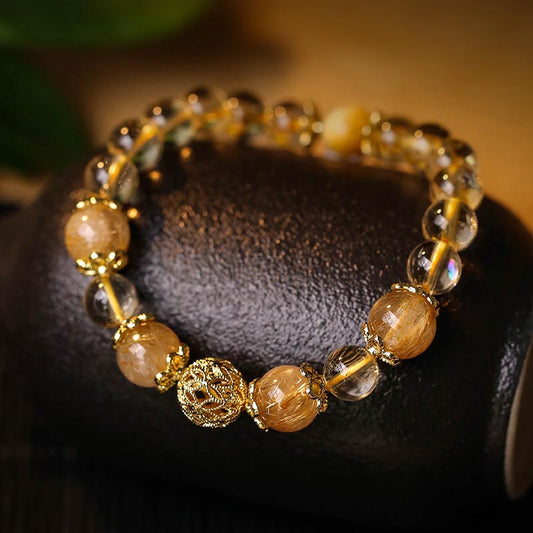 Pulsera de protección de la prosperidad con cuarzo rutilado, amatista y citrino natural de Buddha Stones