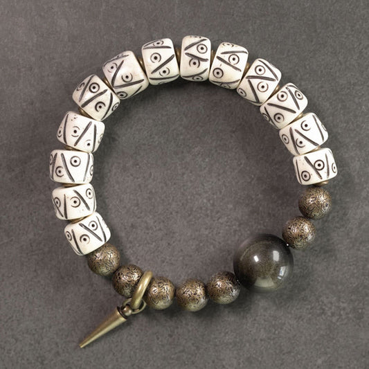 Pulsera de fuerza con cuentas de latón, obsidiana y hueso de yak tibetano, piedras de Buda, brillo dorado