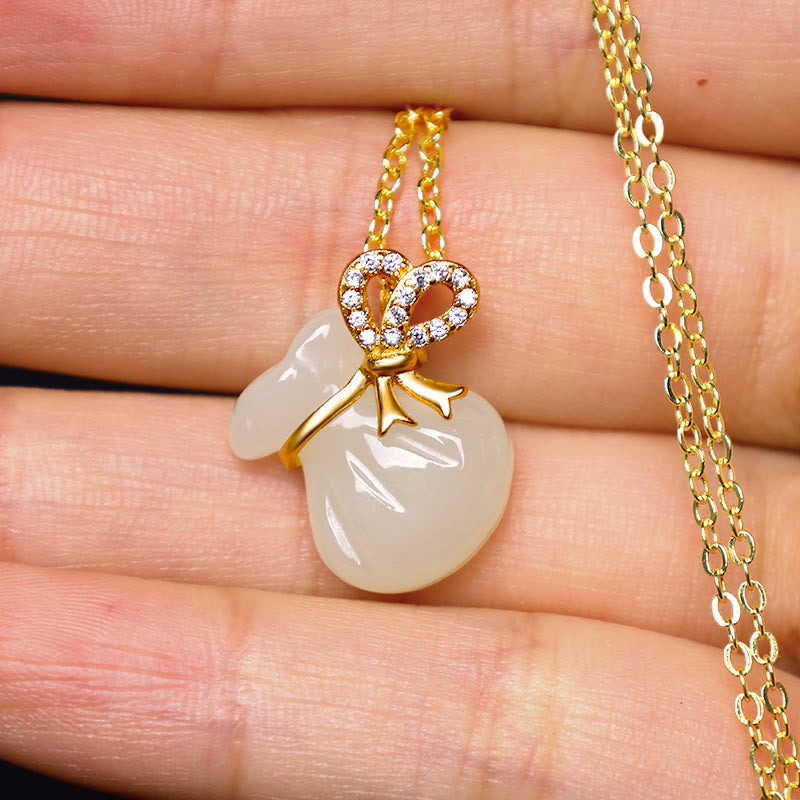 Colgante de jade blanco hetiano natural con piedras de Buda y bolsa de dinero de la suerte