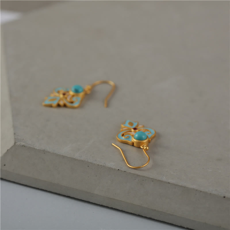 Pendientes colgantes con turquesa, esmalte y cobre de Buddha Stones