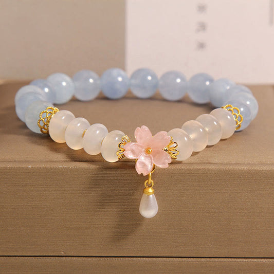 Pulsera curativa con cuentas de ábaco, aguamarina, ágata blanca y flores de Buda