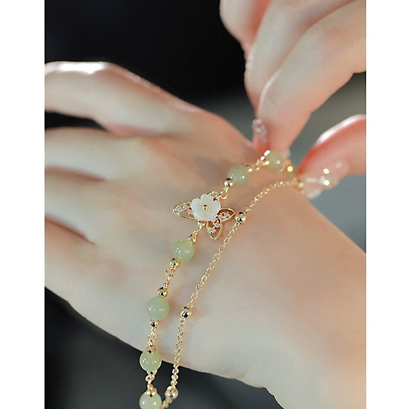 Pulsera de la suerte de doble capa con piedras de Buda, chapada en oro de 14 quilates, jade, mariposa, piedra tridacna y flor