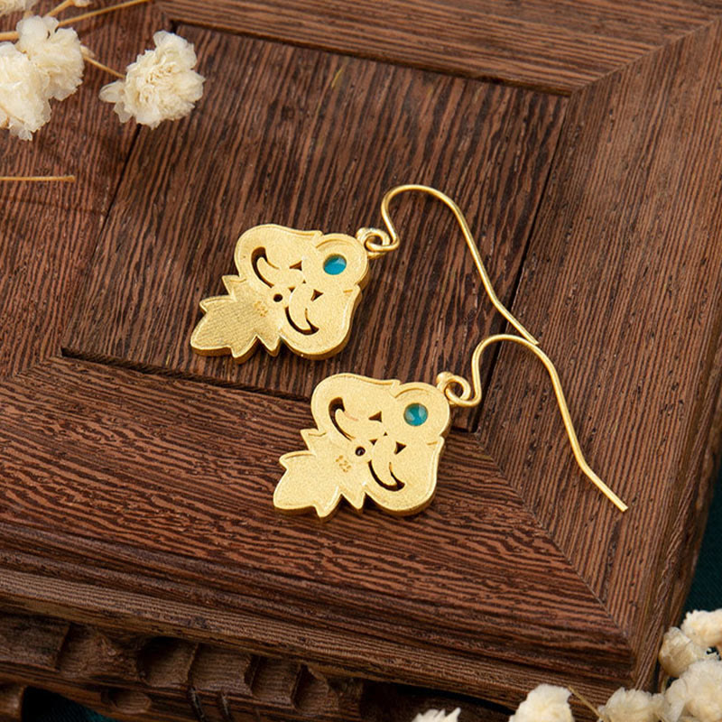 Pendientes colgantes con turquesa, esmalte y cobre de Buddha Stones
