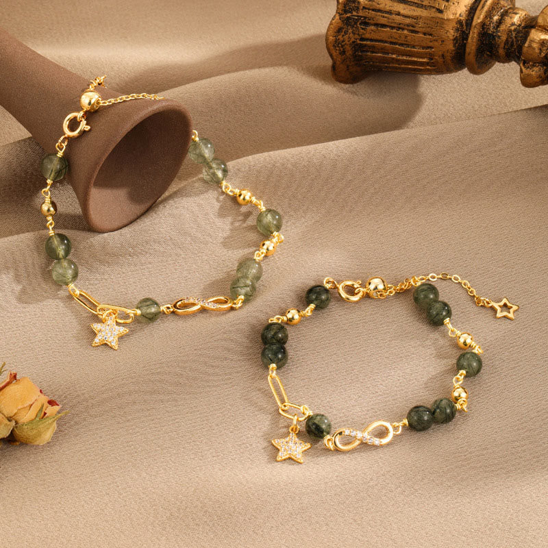 Pulsera de protección de estrellas de amor eterno con lazo de Möbius de cuarzo rutilado verde en oro de 14 quilates de Buddha Stones