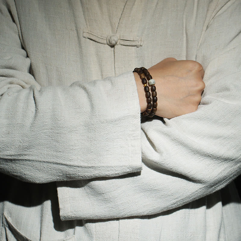 Buddha Stones 999 Gold Seltenes Tarakan-Adlerholz Tibetischer Alter Geistknochen Gleichgewicht Stärke Doppelwickelarmband