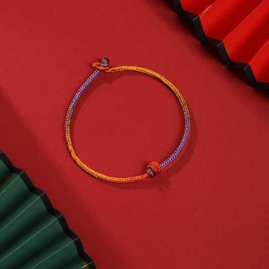 Pulsera trenzada de cuerda, color morado, dorado y rojo, hecha a mano con piedras de Buda