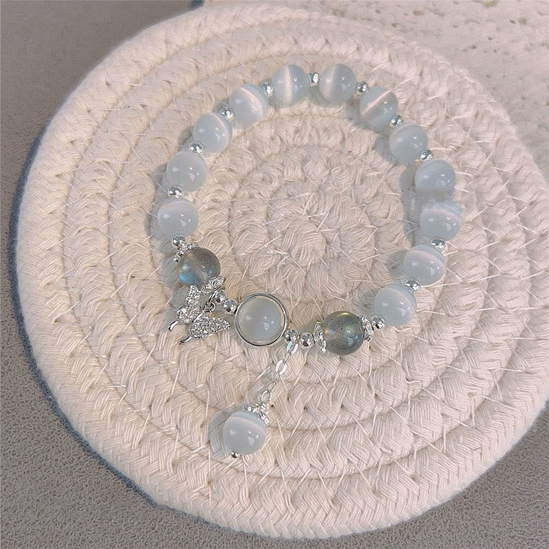 Pulsera de soporte con dije de estrella y mariposa con piedra lunar y ojo de gato de Buddha Stones