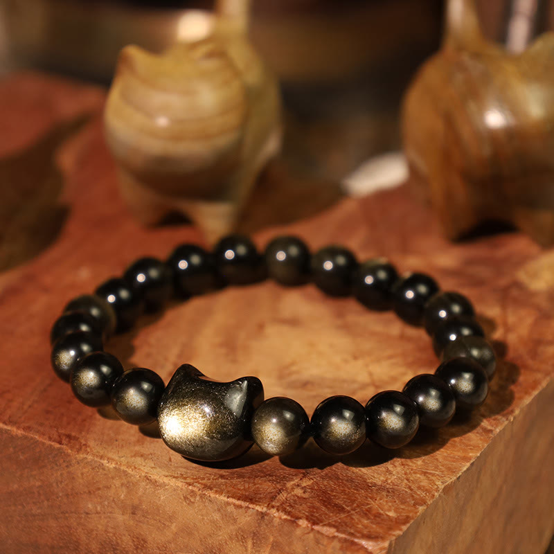 Pulsera de protección con piedras de Buda, obsidiana dorada y obsidiana plateada con brillo, con forma de pata de gato de la suerte.