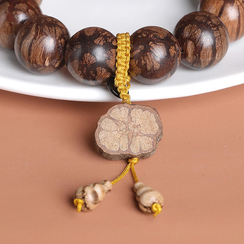 Pulsera de paz interior de madera de flor de ciruelo con piedras de Buda