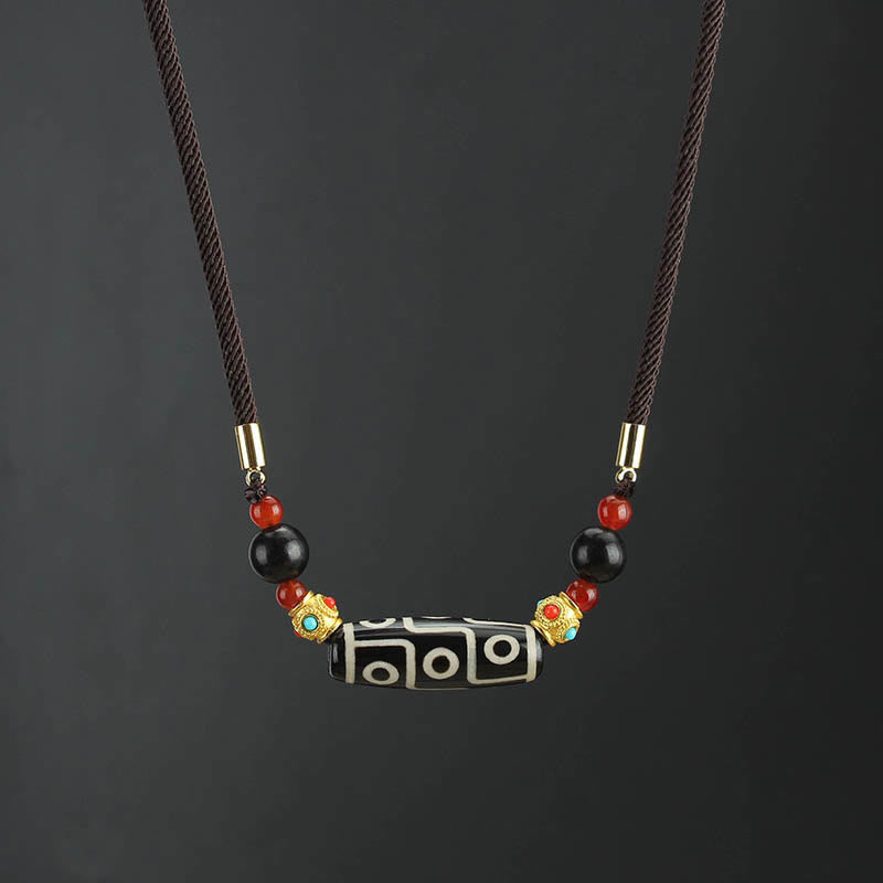 Collar con colgante de hilo con cuentas Dzi tibetanas de nueve ojos y piedras de Buda con bendiciones de protección
